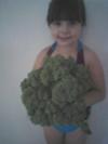 Savanna holding a head of broccoli