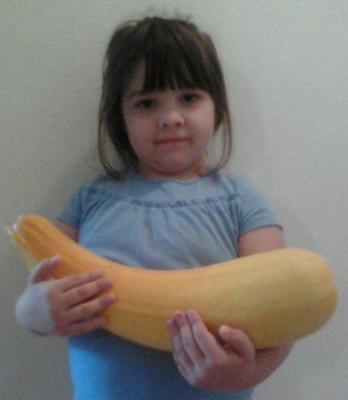 My daughter holding the 'Baby Squash'
